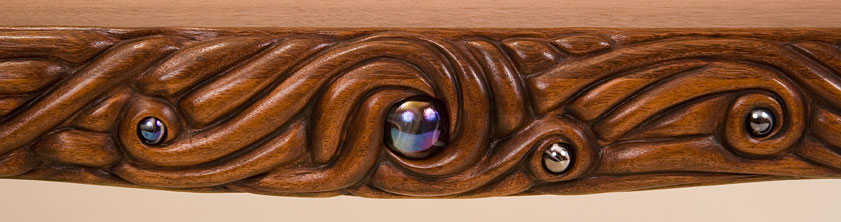 Detail of side showing inlaid glass marbles