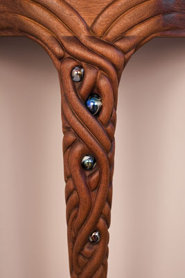 Detail of how the carved tendrils wrap over each other