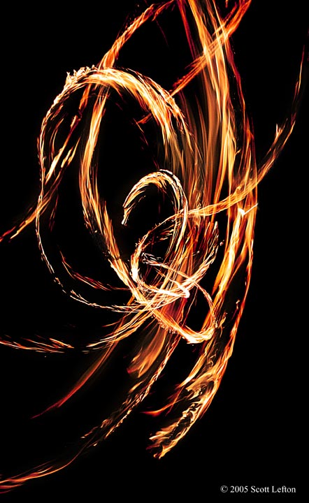 Firedance 1 - Swirls of fire from a long-exposure firespinning shot, photoshopped to increase the color range.